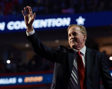 Ken Paxton waves his hand at the Republican national midterm convention