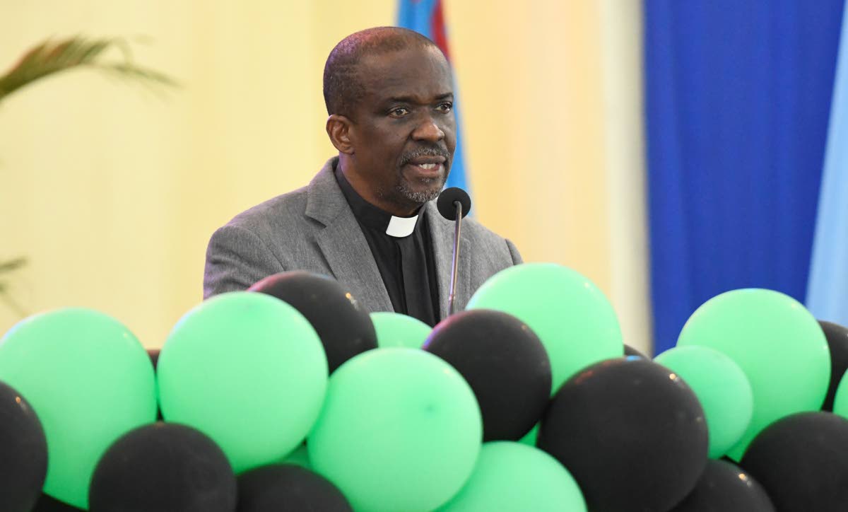The Reverend Devon Dick, pastor at Boulevard Baptist Church, delivers the sermon.