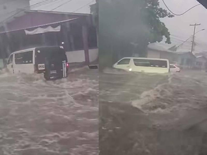 La corriente de agua arrastró un microbús en la 13 calle de San Pedro Sula durante la fuerte tormenta.